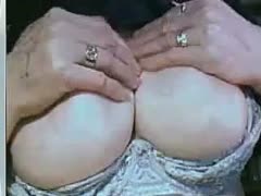 An elderly German mother's large, wet breasts captured on webcam